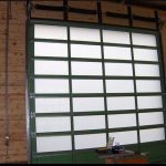 Insde of a Closed Large Green Garage Door
