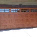Photo of a wood residential double garage door
